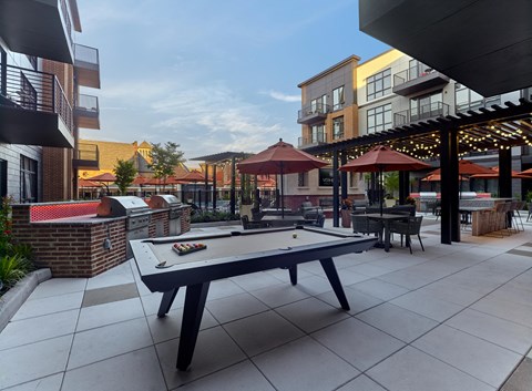 outdoor amenities, club room, out door pool table, patio activities