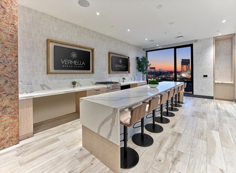 Clubroom with private demo kitchen and resident lounge at Vermella Broad Street, Newark NJ