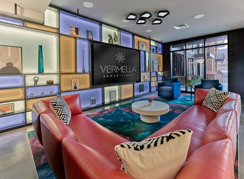 clubroom, resident amenity space, bar area, lounge seating, billiards, shuffleboard, fireplace,