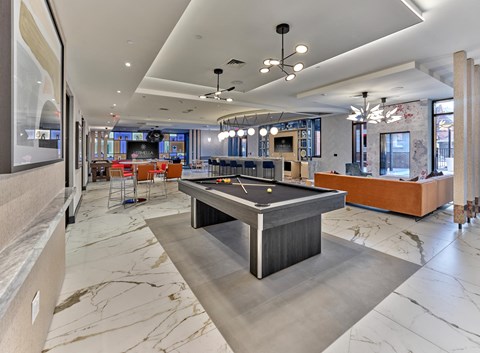 clubroom, game tables, media wall, lounge seating, bar area,