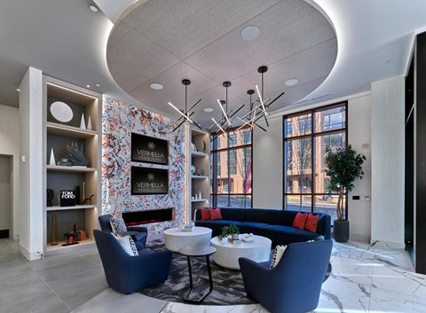 Clubroom with coworking lounge seating, private conference rooms, Vermella Broad Street Newark NJ