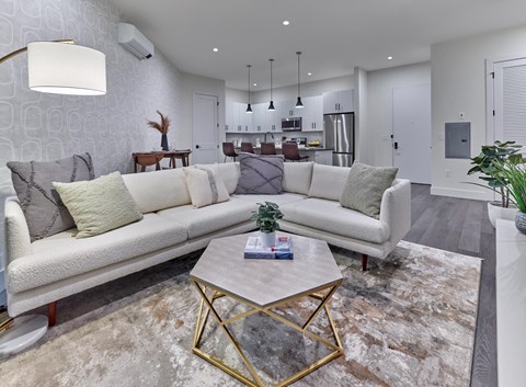 a living room with a couch and a coffee table