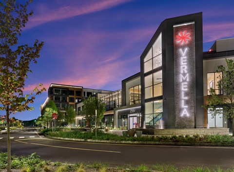 A building with a sign that says "VERMELLA" on it.