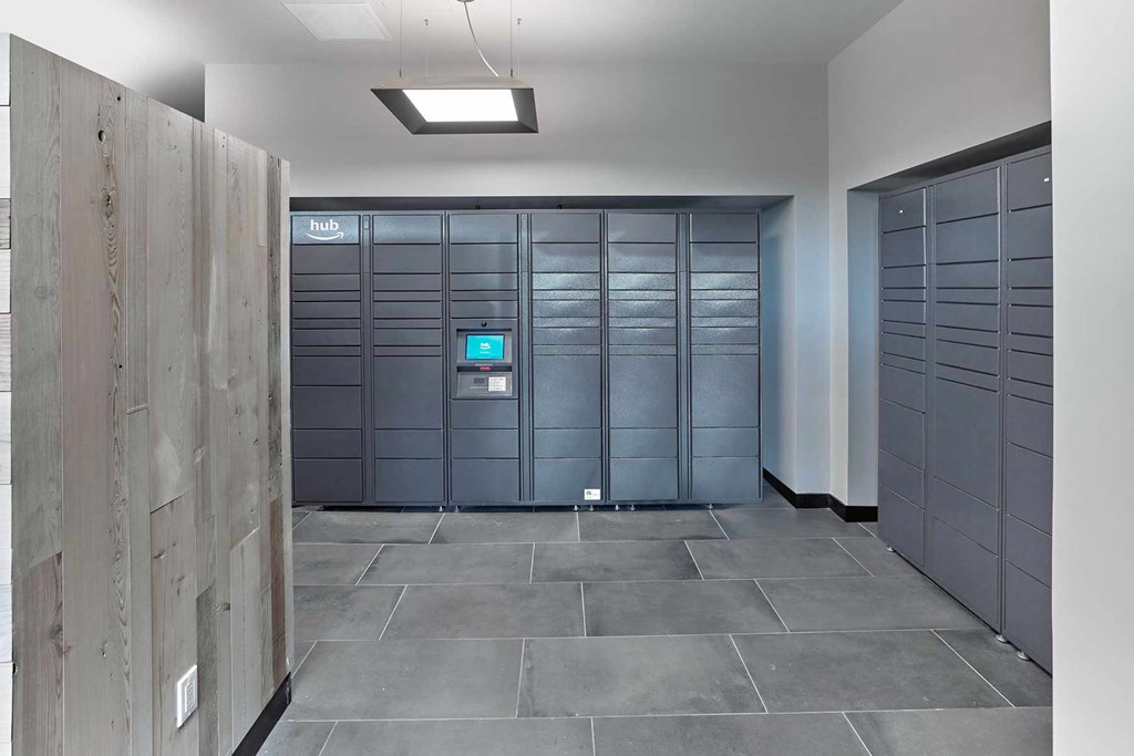 A room with a row of storage lockers.