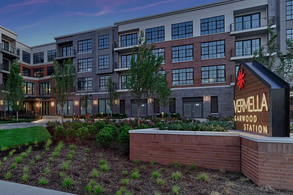 A modern building with a sign that reads "VERMELLA GARWOOD STATION".