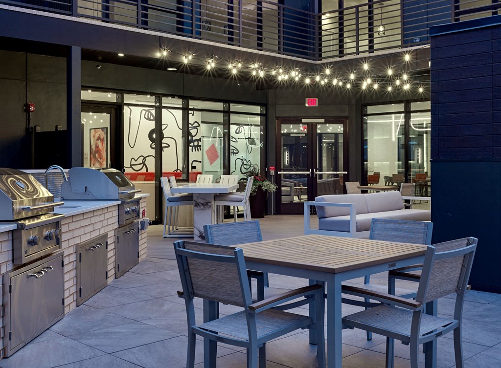 outdoor lounge, clubroom, fire place, grills