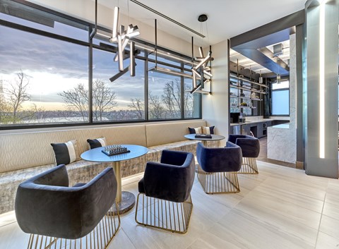 A modern living room with a view of the outdoors.