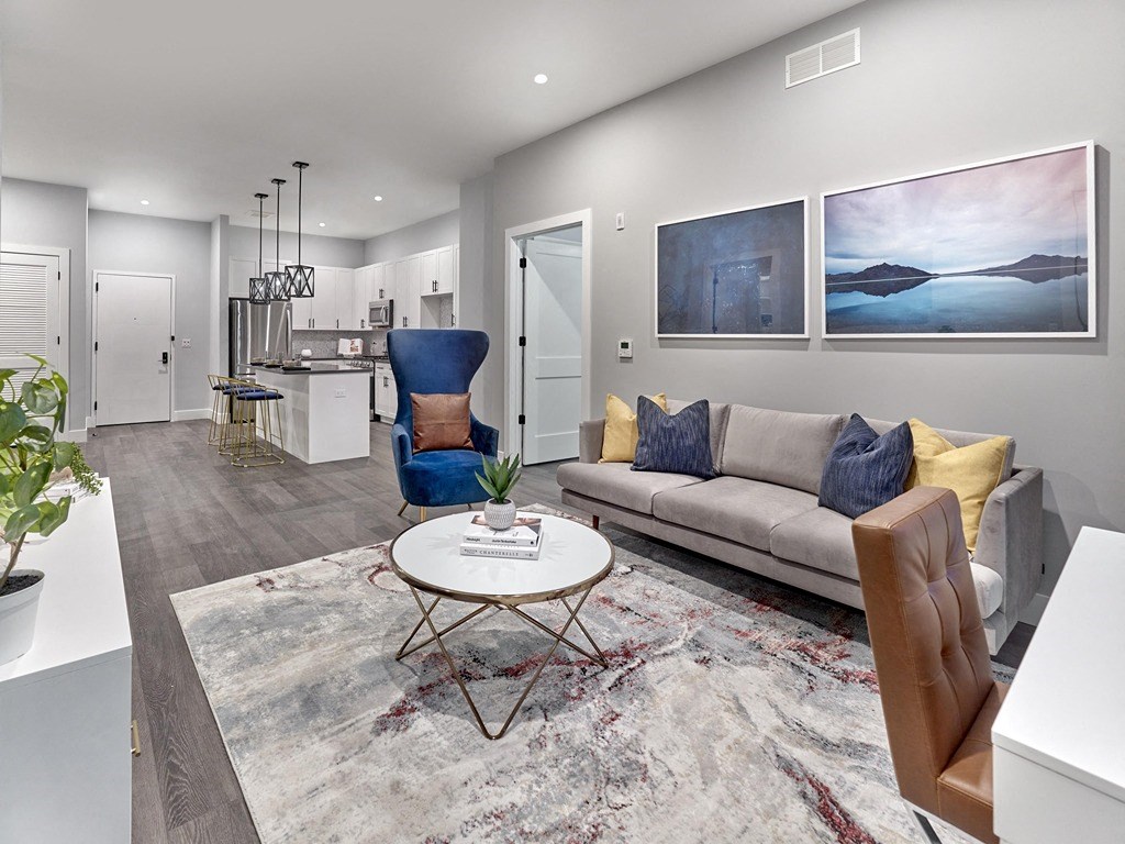 a living room with a couch and a table