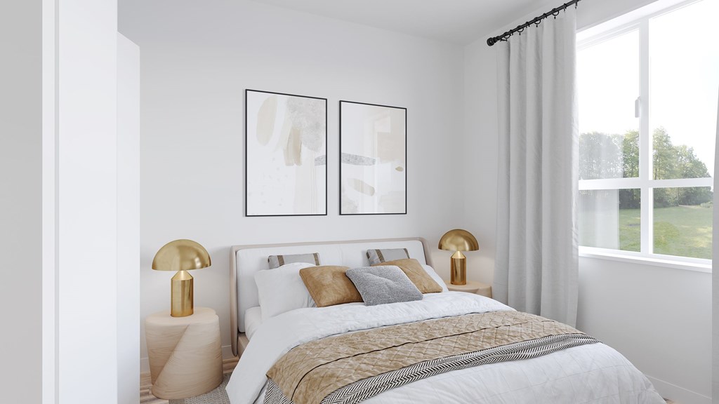 A bedroom with a large bed and two lamps.