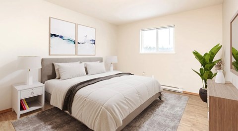 A bedroom with a queen sized bed, two nights stands and a small dresser.