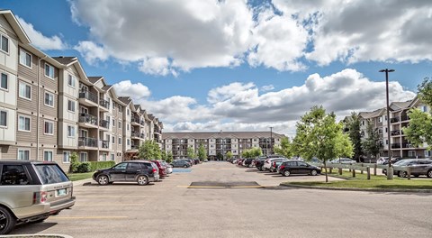 large apartment complex with parking up front