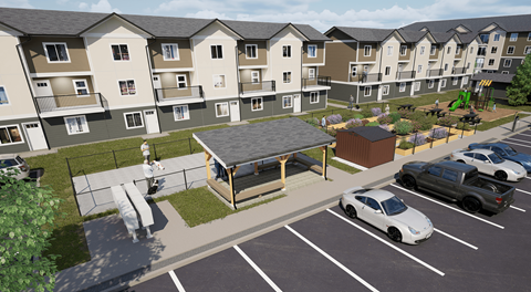 Multiple townhomes with a parking lot separated by a dog run, pergola, community garden and playground