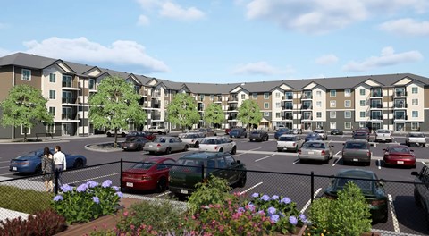A large apartment complex with large parking lot