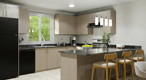 A modern kitchen with wooden cabinets and black appliances.