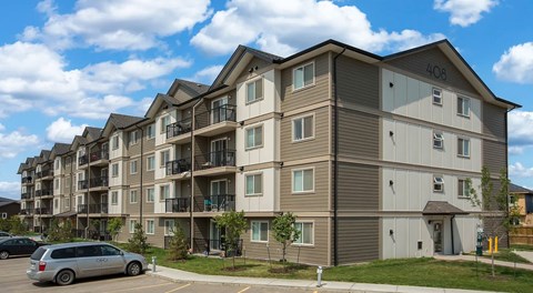 Apartment building with parking in front