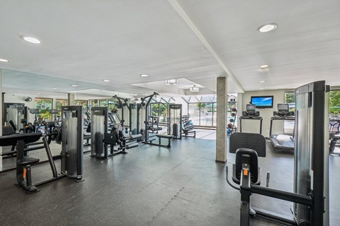A spacious 24/7 fitness center with Peloton and LifeFitness equipment
