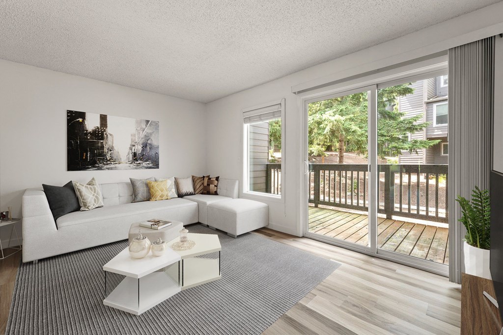 a living room with a white couch and a sliding glass door at Larkspur West Linn, Oregon, 97068