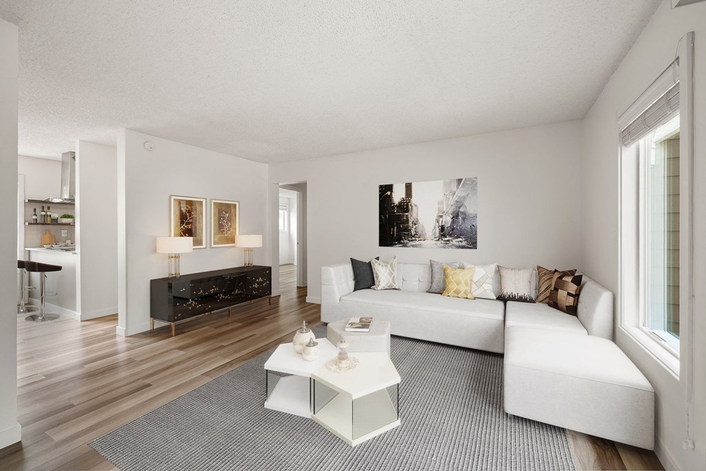 a living room with a white couch and a coffee table at Larkspur West Linn, West Linn, OR