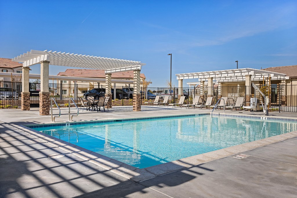 the swimming pool at the falls at rolland park apartments fl