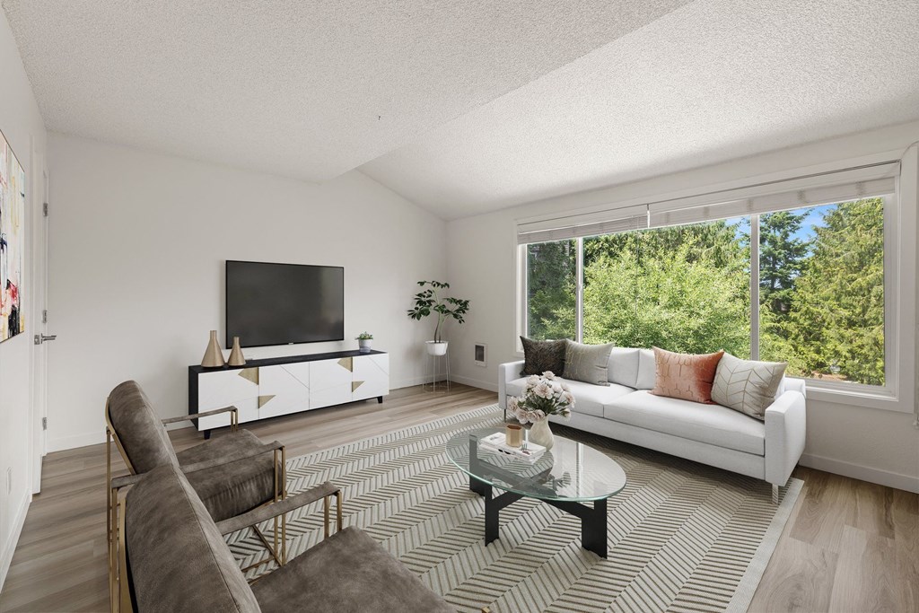 a living room with a couch and a coffee table at Larkspur West Linn, West Linn