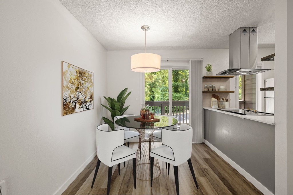 an image of a dining room with a table and chairs  at Larkspur West Linn, Oregon, 97068