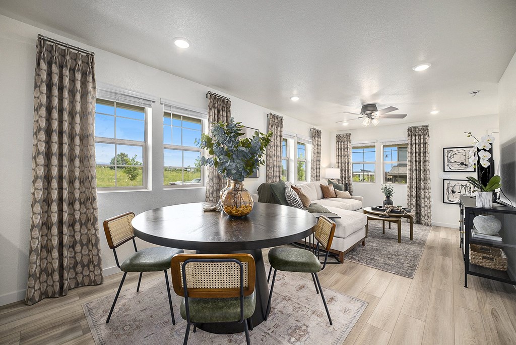 a living room with a table and a couch