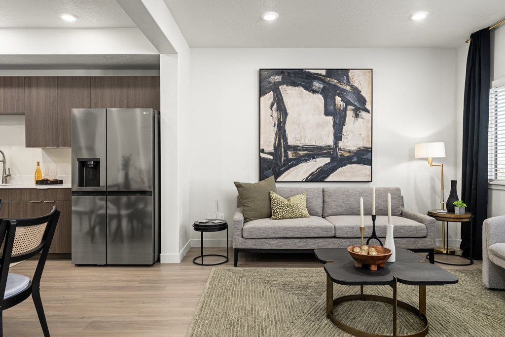 a living room with a couch and a table