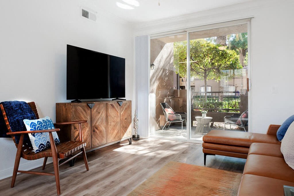 Living Room With Balcony at The Missions at Rio Vista, San Diego, CA