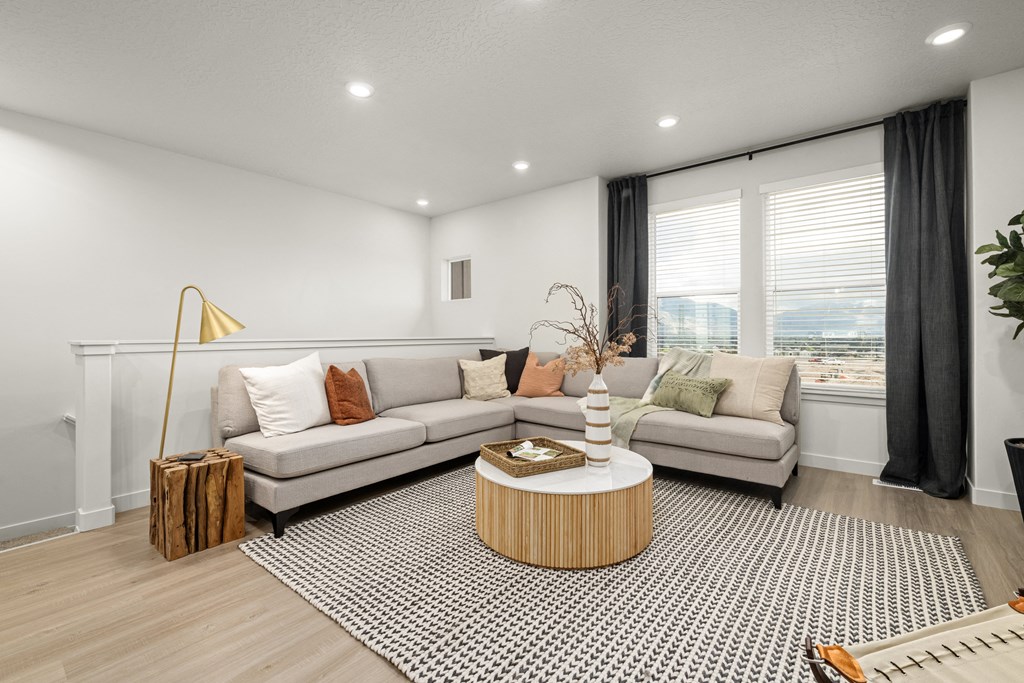 a living room with two couches and a coffee table