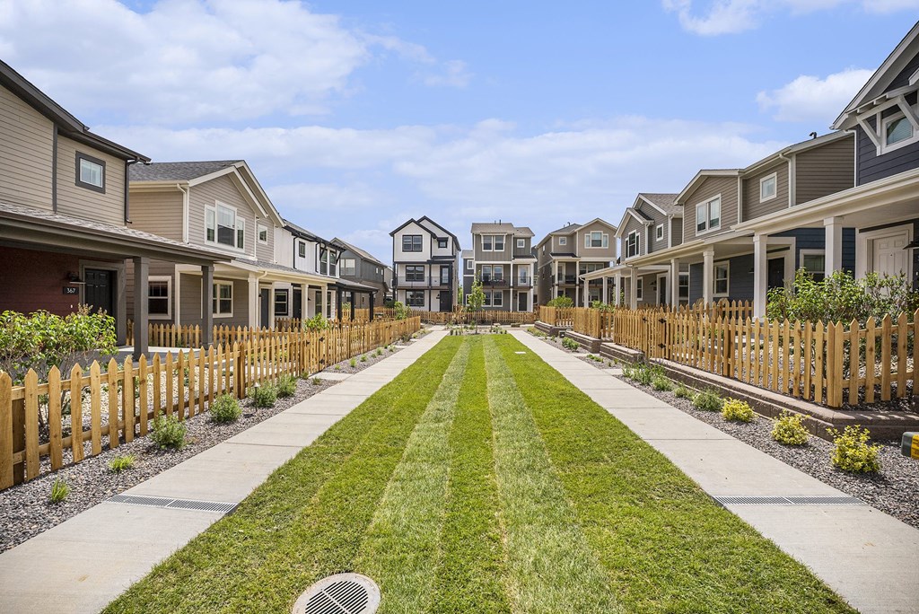 Fenced yards & individual porches.