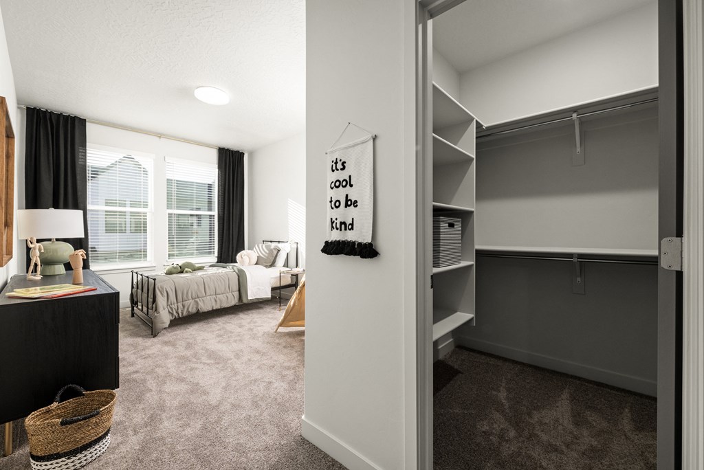 an open living room with a closet and a living room