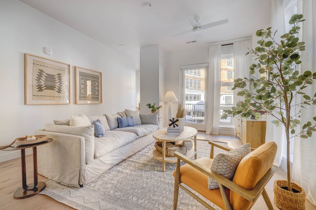 a living room with Swiss Krono Wood Plank Flooring