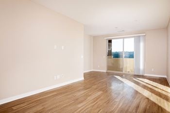 Living room with wood floors at Ocean Air, CA, 92130