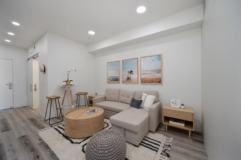 a living room with a couch and a coffee table
