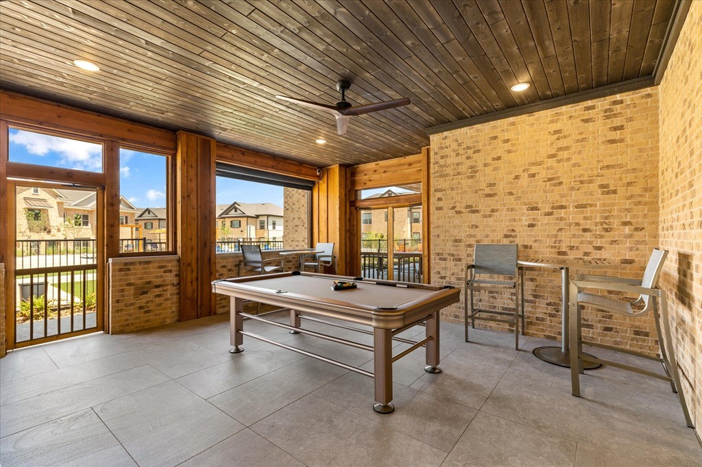 enjoy a game of pool in the covered patio