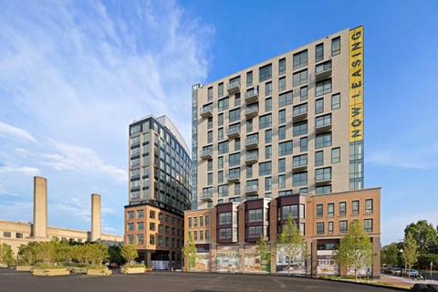 A Howlett Leasing building is in the background of a parking lot.