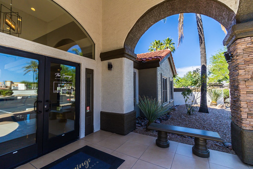 a bench in front of a building