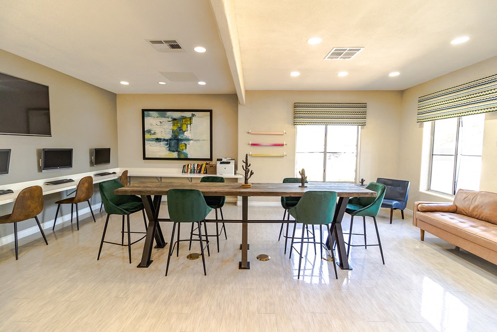 the reserve at bucklin hill leasing office common area with table and chairs