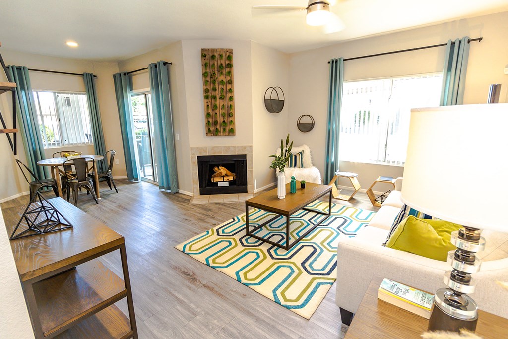 living room at the oaks of westchase apartments in houston, tx