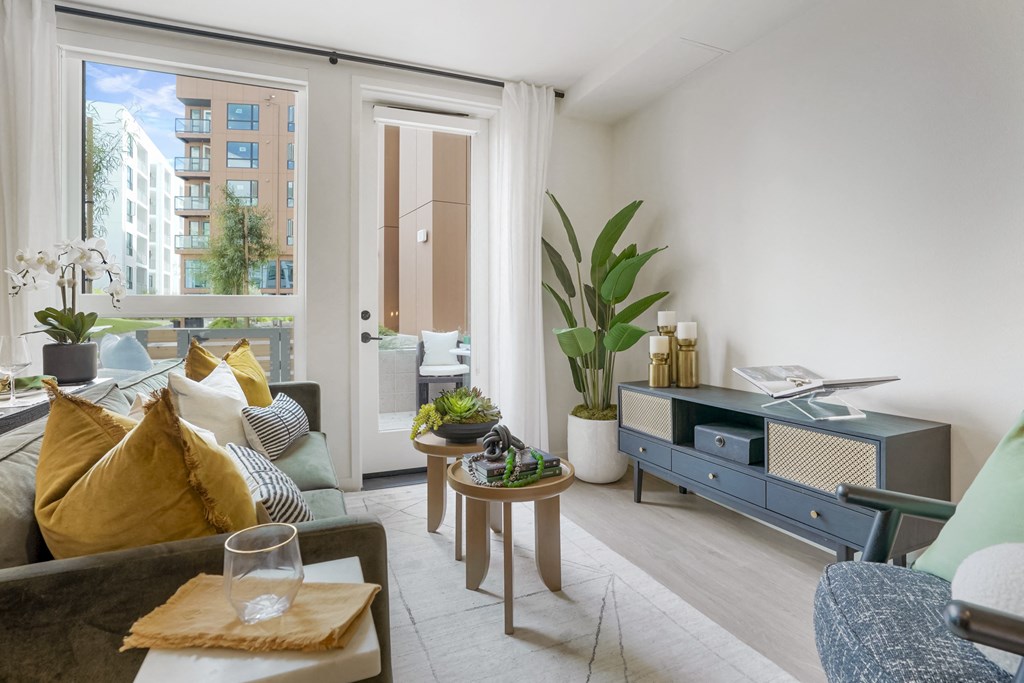 a living room with a couch and a tv