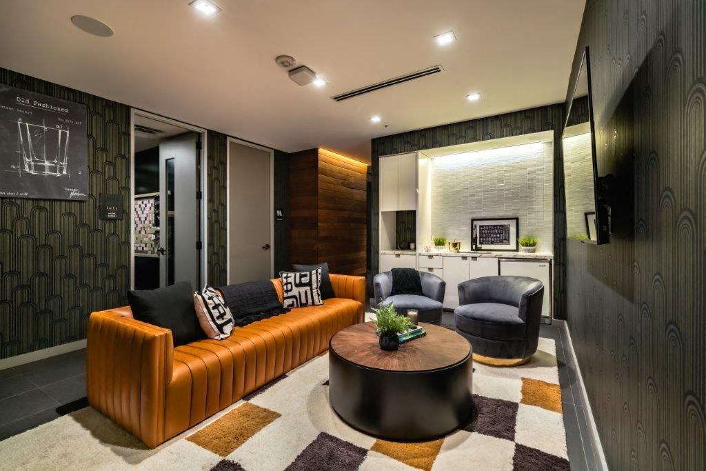 a living room with a couch and a table
