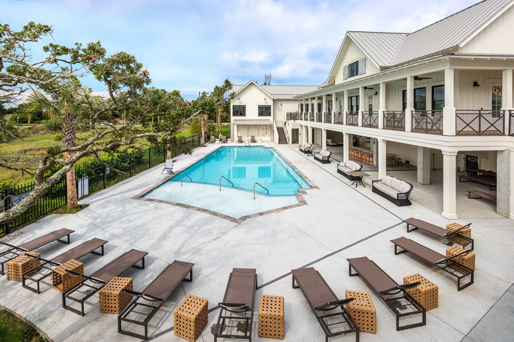 Sparkling swimming pool with marsh view