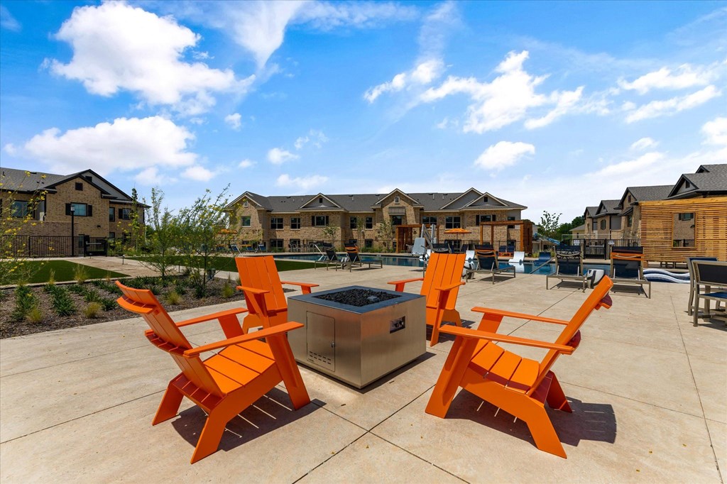 outdoor firepit with lounge chairs