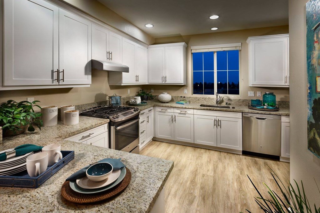 Large kitchen with white cabinets at Ocean Air, San Diego California