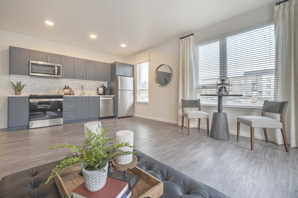a living room with a couch and a table