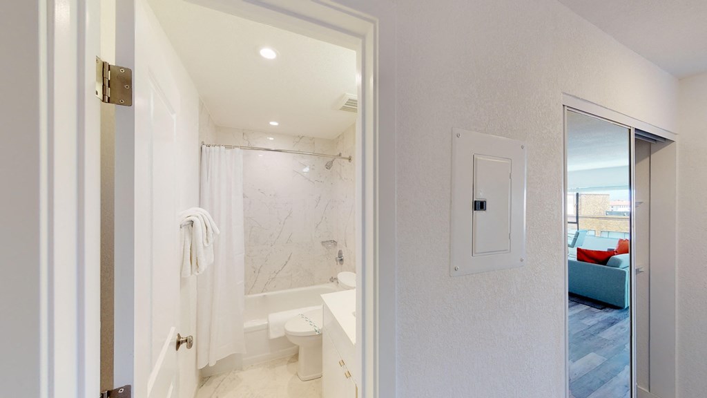a bathroom with a bathtub and a sink
