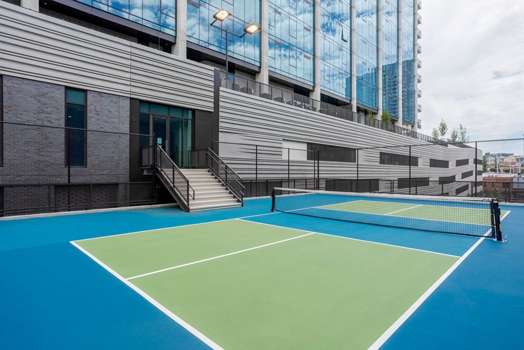 a tennis court on the side of a building