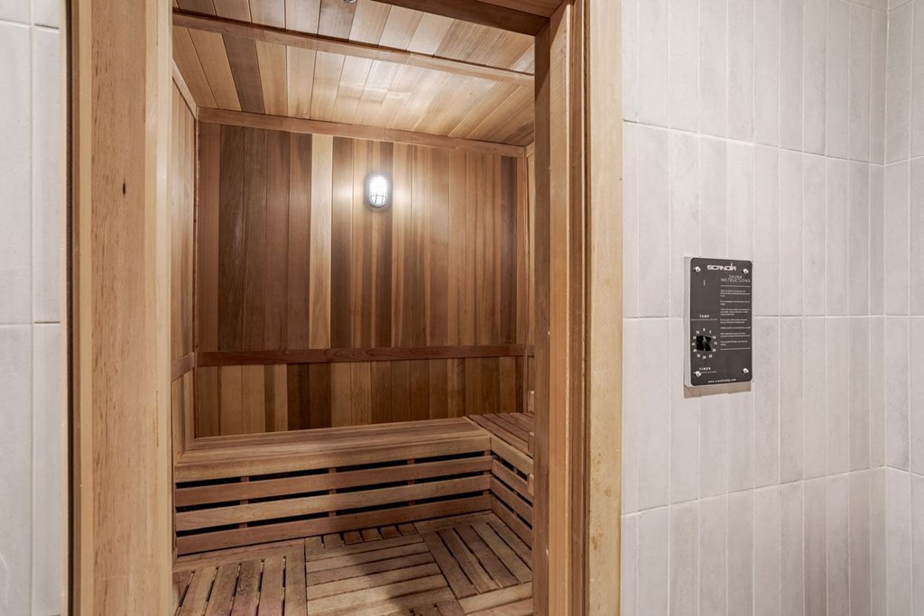 an infrared sauna is shown in a wood paneled room