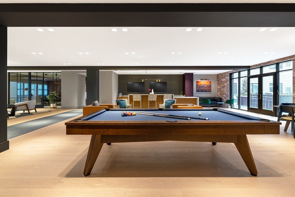 a billiards table in a lobby of a hotel