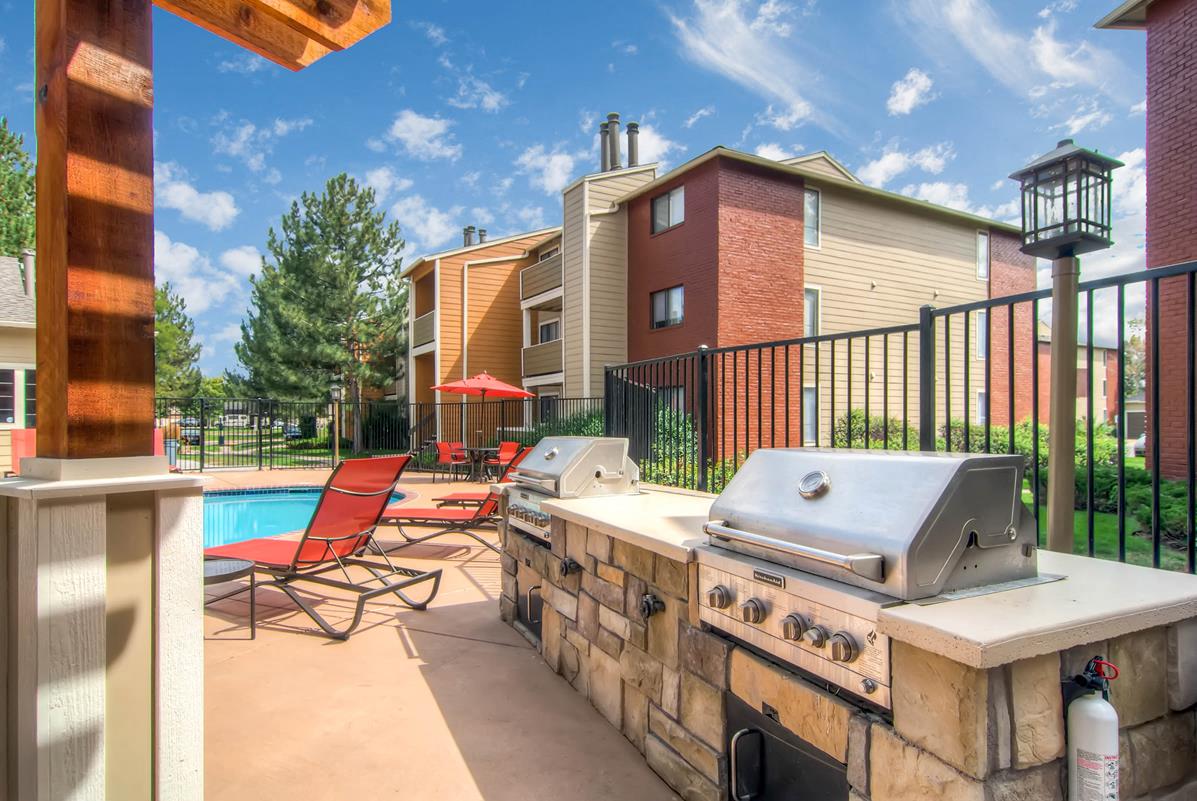 Barbecue Area with two grilling stations next to the pool